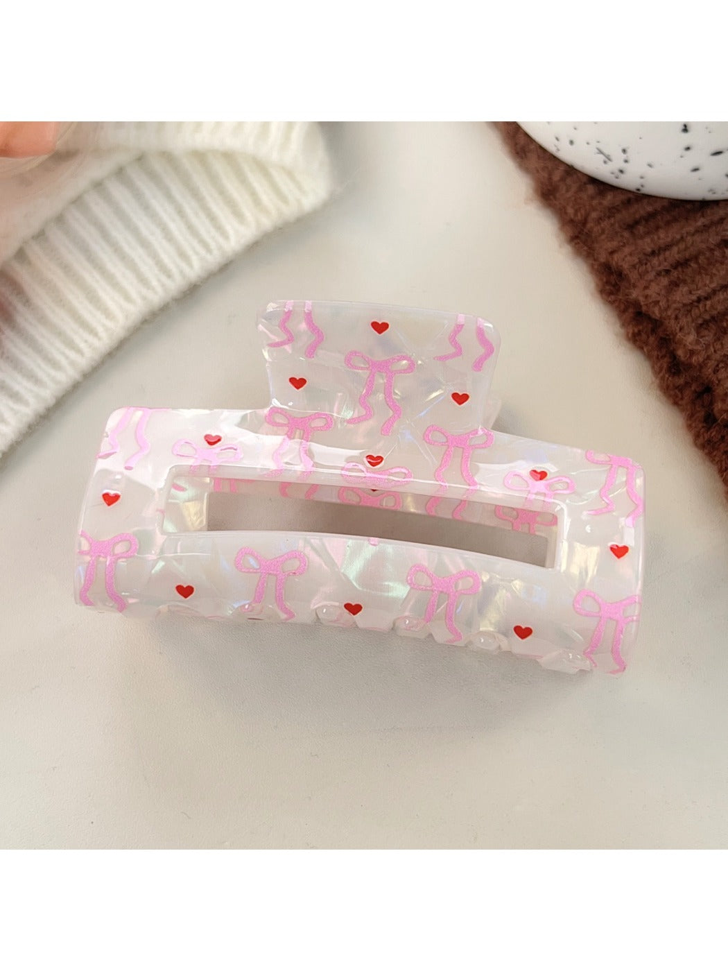 Beau hair claw clip displayed alongside matching hair accessories