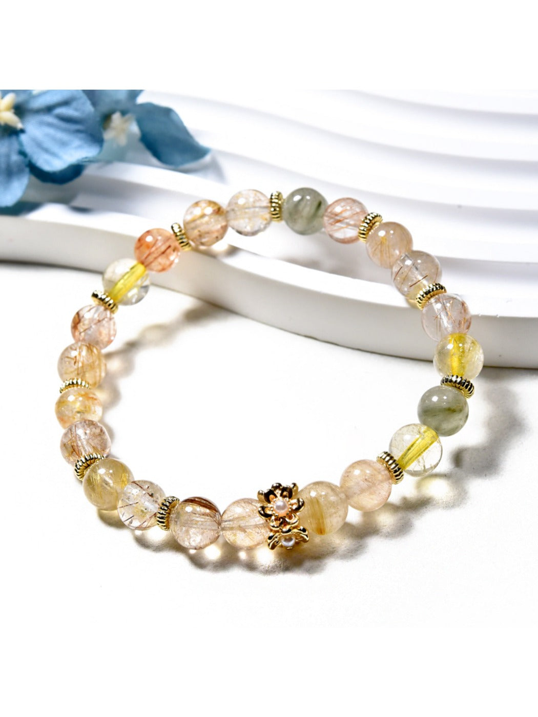 Lovra minimalist crystal beaded bracelet displayed on a wooden surface