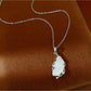 Nozari - Geometric Feather Accent Copper Pendant Necklace