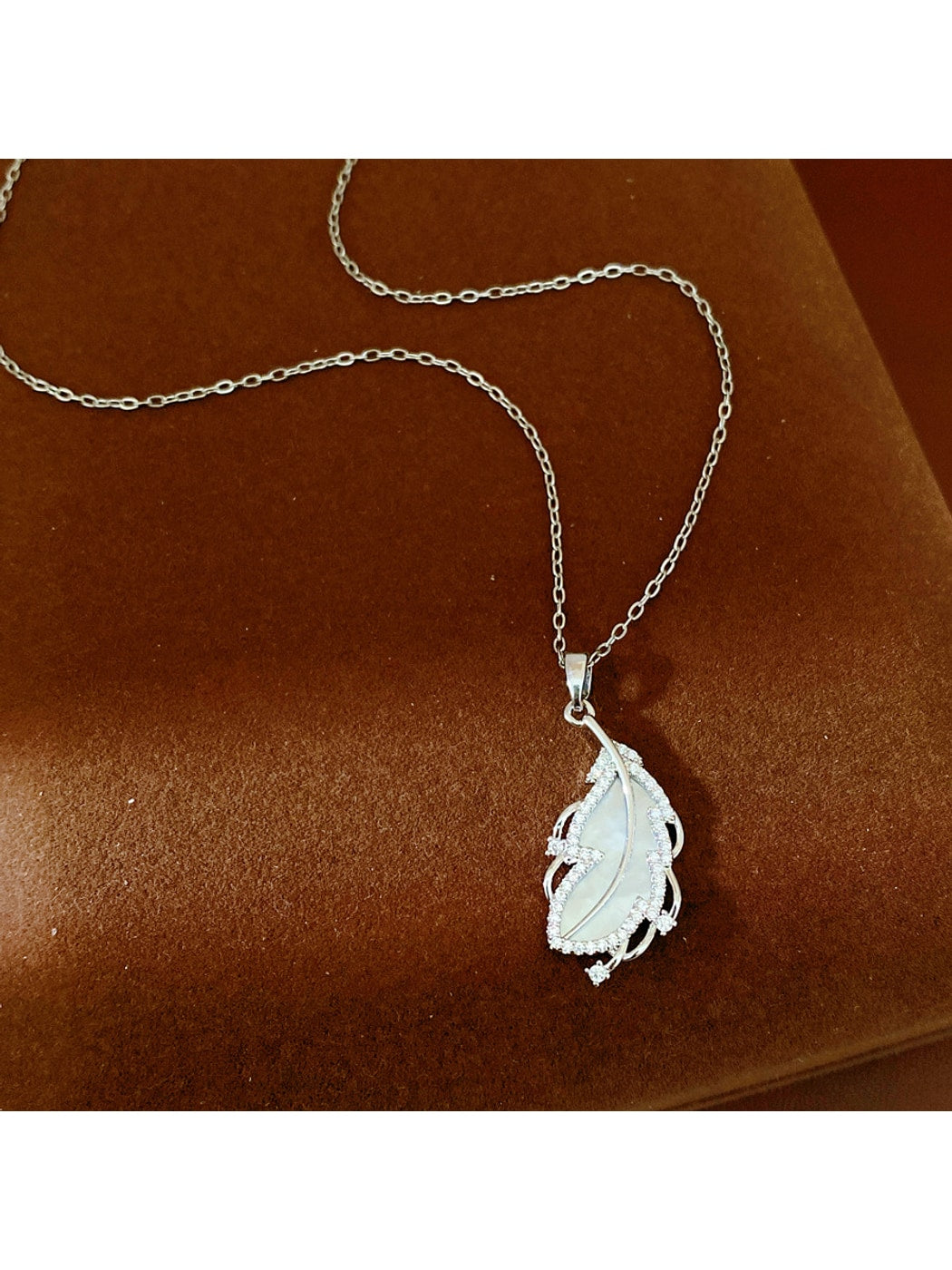 Nozari - Geometric Feather Accent Copper Pendant Necklace
