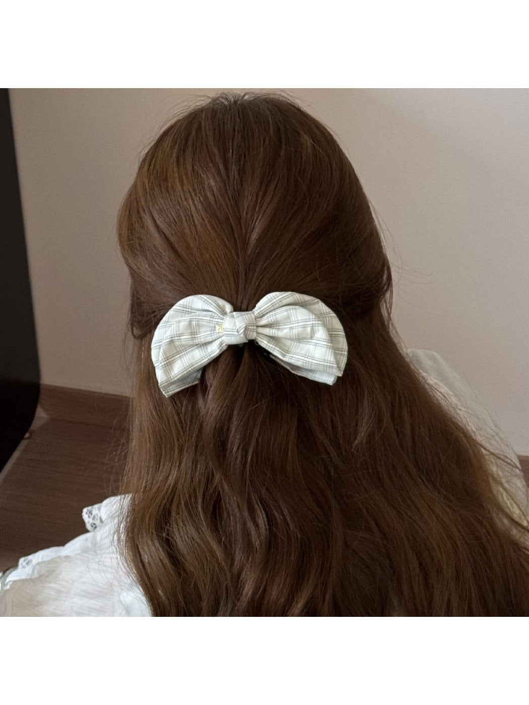 Close-up of Beau elegant bow banana clip showing bow detail and clasp mechanism