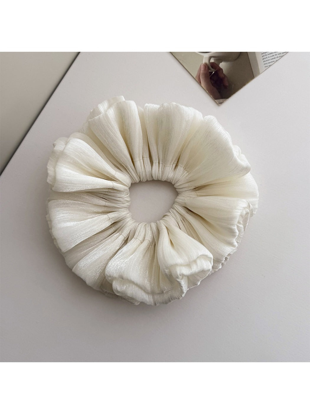 Gifty shimmer scrunchie displayed on white background showing full shape