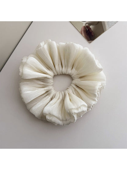 Gifty shimmer scrunchie displayed on white background showing full shape