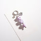 Multiple Keypus star keychains in different colors arranged in a row