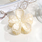 Beau - Textured Plastic Seashell Silhouette Claw Clip
