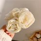 Close-up of Beau rose decorated hair claw clip showing detailed floral design