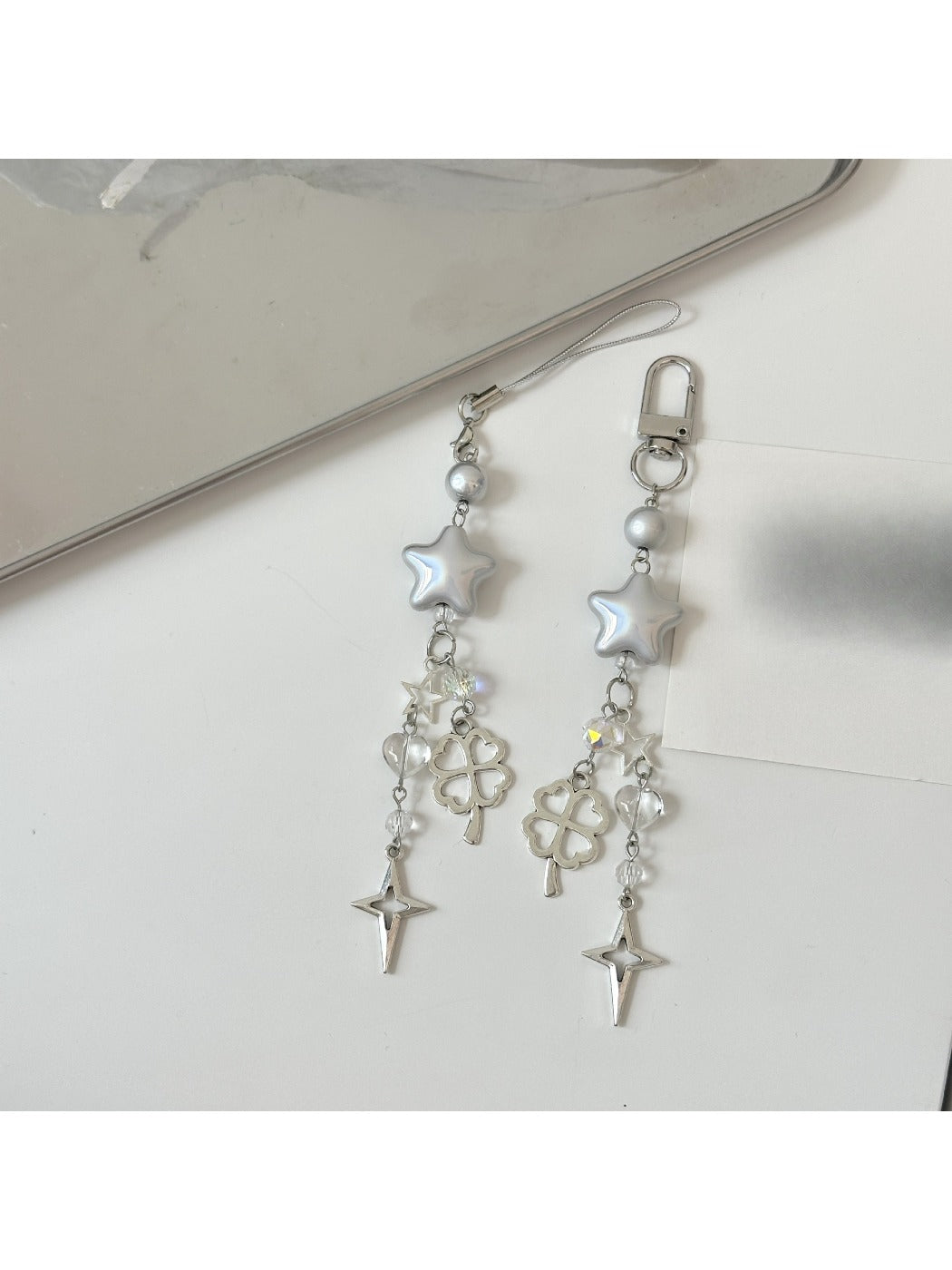 Holographic star keychain hanging from a set of keys