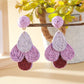 Earedge chic color block raffia drop earrings photographed with soft shadows