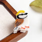 Brown eye bird hair claw clip