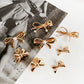 Beau classic bow hair clip displayed from side angle highlighting bow shape