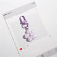 Side view of the flower keychain highlighting its thickness and texture