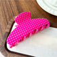 Beau Candy Polka Dot acetate claw clip open showing metal spring mechanism