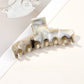 Beau - Marble Swirl Triangle PC Claw Hair Clip