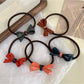 Gifty - Acrylic Bow Hair Tie
