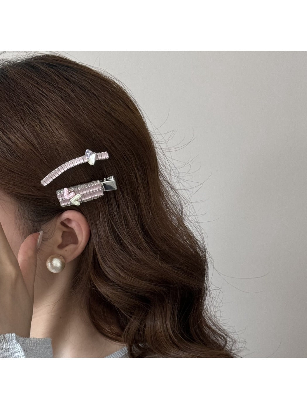 Beau chic flat hair clip held in hand to show size and shape