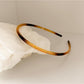 Gifty vintage chic thin headband styled with vintage-inspired outfit