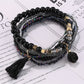 Side view of Lovra flower pendant beaded bracelet highlighting bead texture