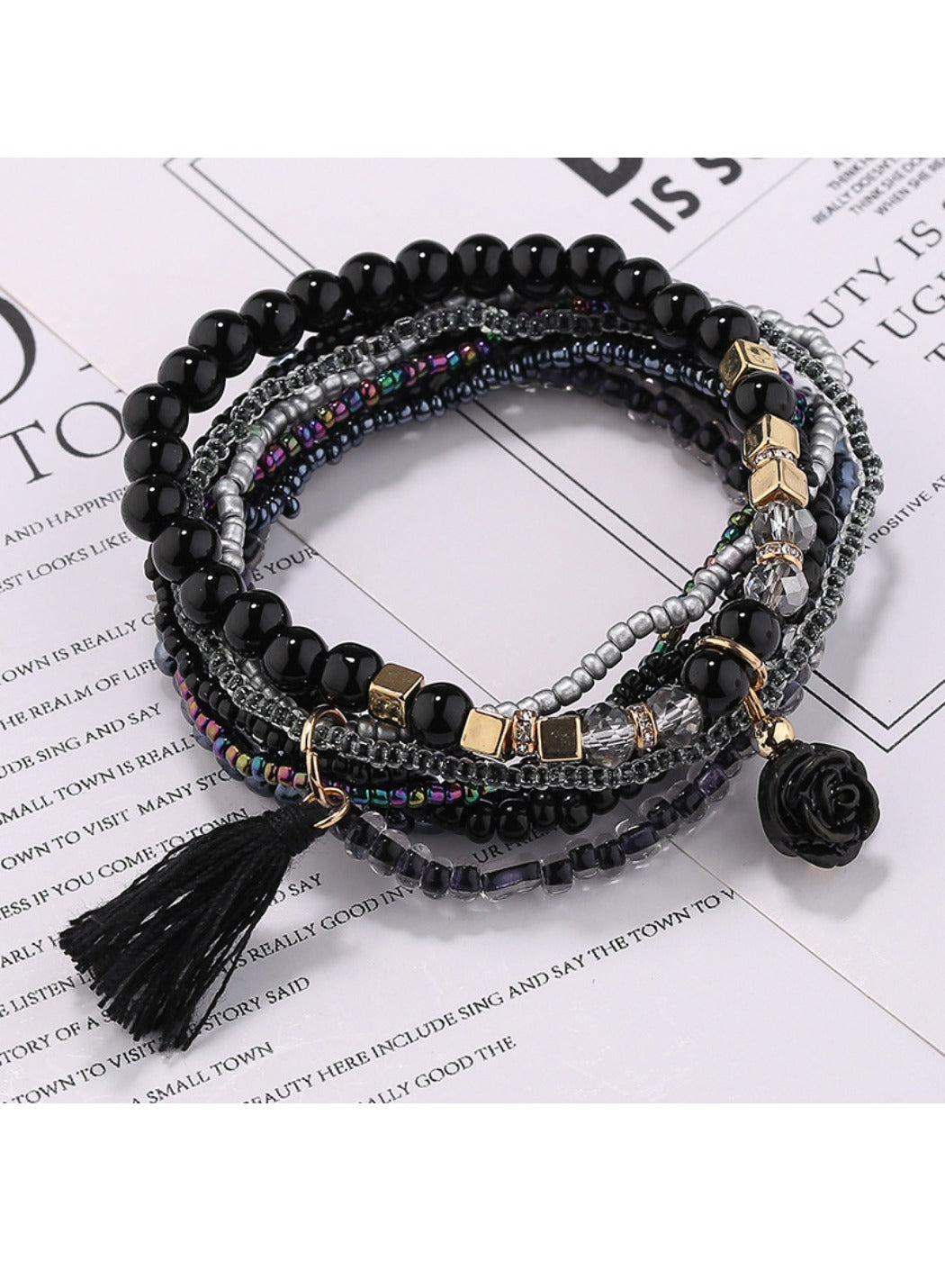 Side view of Lovra flower pendant beaded bracelet highlighting bead texture