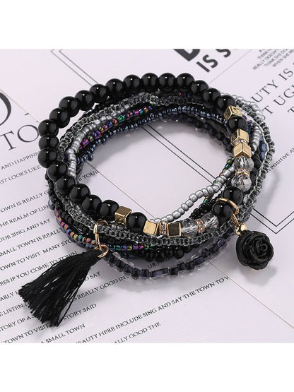 Side view of Lovra flower pendant beaded bracelet highlighting bead texture