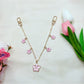 Side view of minimalist cherry blossom pendant highlighting its slim profile and craftsmanship