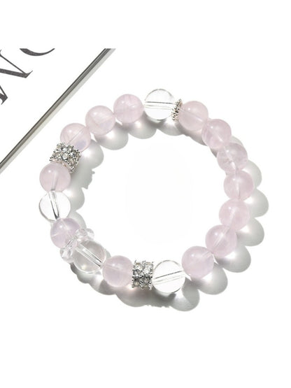 Side view of Lovra pink and white crystal beaded bracelet showing bead details