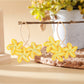 Detailed shot of the flower petal texture on Earedge Sweet Flower Shaped Drop Earrings