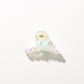 Bright multi color hair clip shown alongside matching accessories