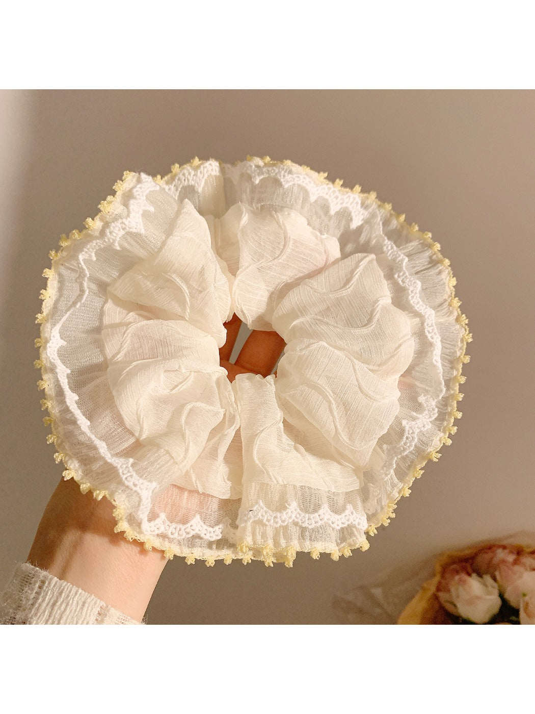 Gifty ruched scrunchie displayed on a white background showing texture