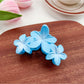 Back view of Beau Sweet Three Flower Hair Claw Clip showing clasp details