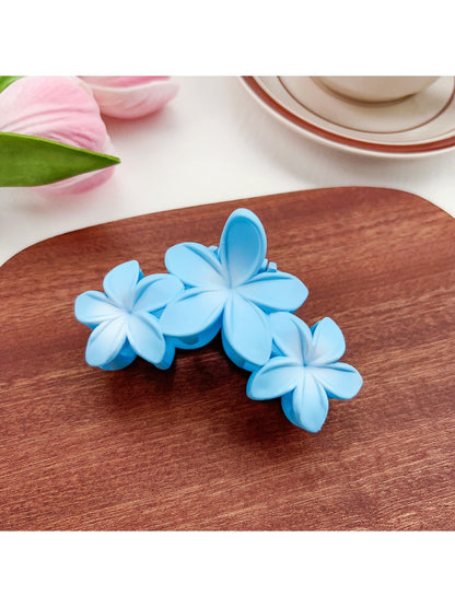 Back view of Beau Sweet Three Flower Hair Claw Clip showing clasp details