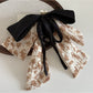 Back view of Beau Ink Wash Bow Ribbon Claw Clip showing clasp mechanism