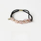 Gifty chic beaded hair tie packaged in branded box with clear window
