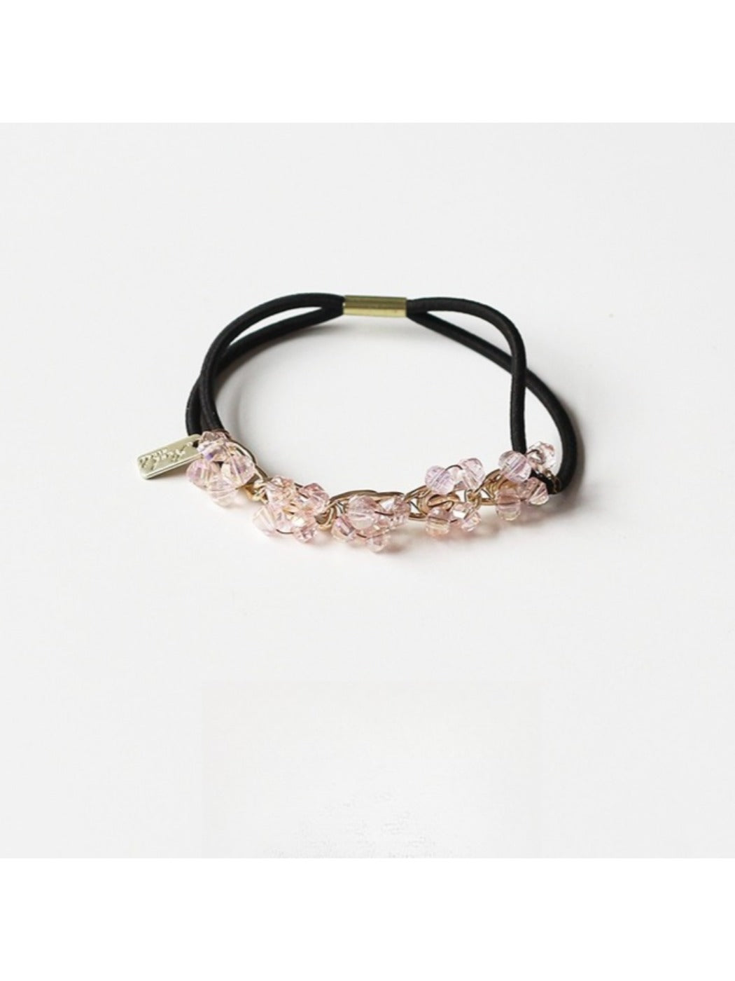 Gifty chic beaded hair tie packaged in branded box with clear window
