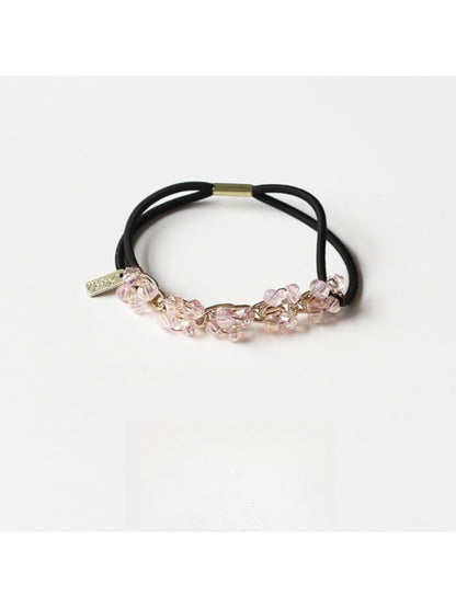 Gifty chic beaded hair tie packaged in branded box with clear window