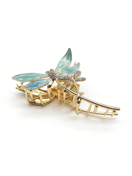 Close-up of Beau elegant dragonfly shaped hair clip with intricate wing details