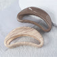 Beau semi circular hollow hair clip in matte gold finish on white background