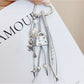 Close-up of Keypus bag charm keychain showing detailed character face and keyring