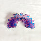 Top view of Beau Wave Cloud Shaped Claw Clip showing cloud shape