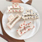 Beau floral print square hair claw clip on white background