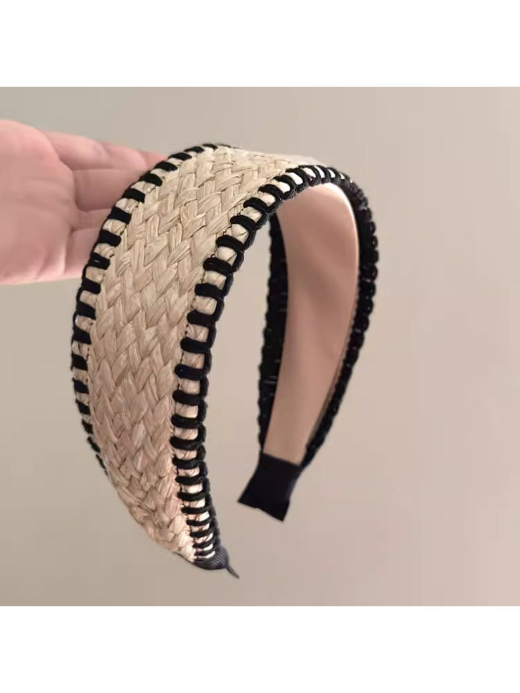 Bohemian wide minimalist headband in neutral tones displayed on a white background