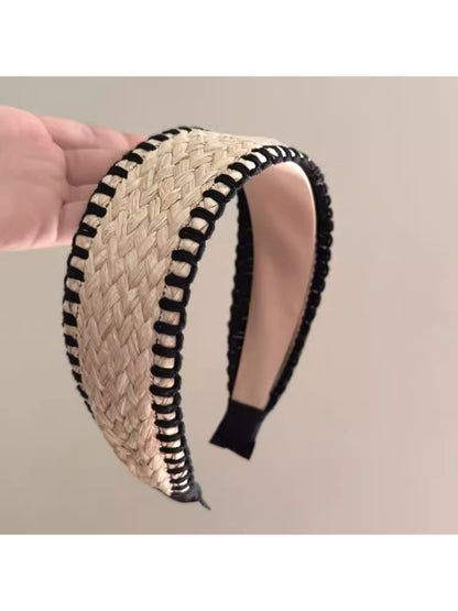 Bohemian wide minimalist headband in neutral tones displayed on a white background