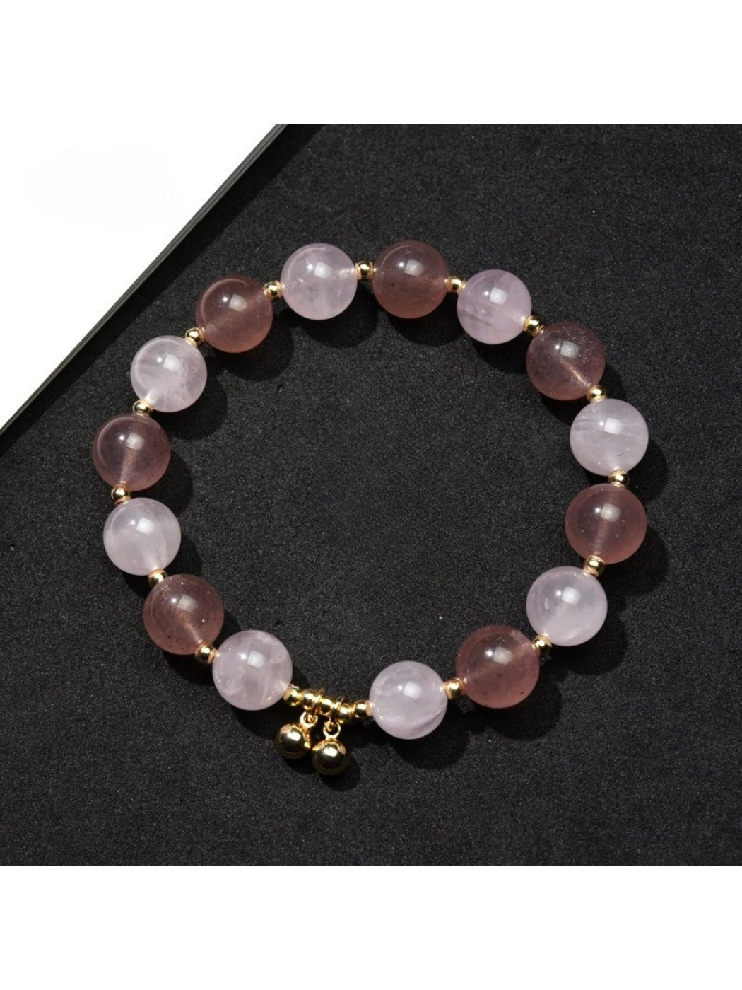 Lovra minimalist heart pendant beaded bracelet on a white background