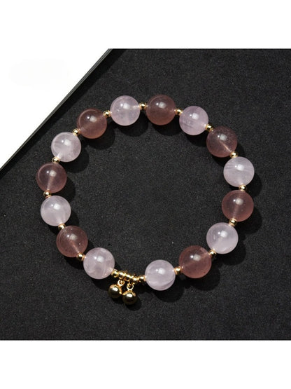 Lovra minimalist heart pendant beaded bracelet on a white background