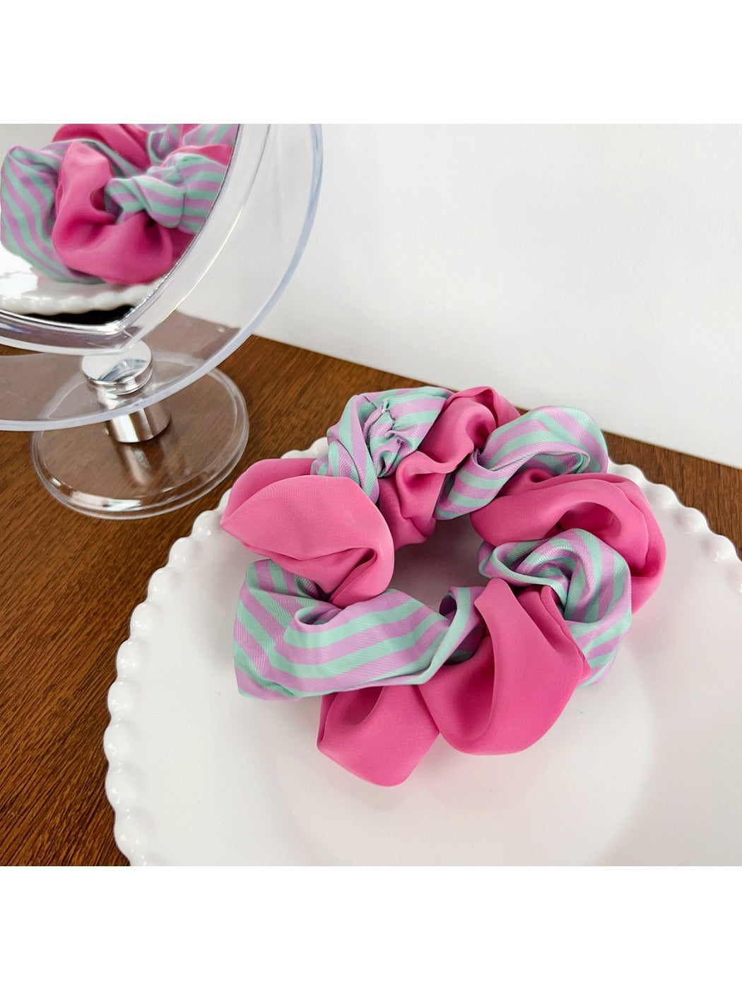 Scrunchie wrapped around wrist as a fashion accessory