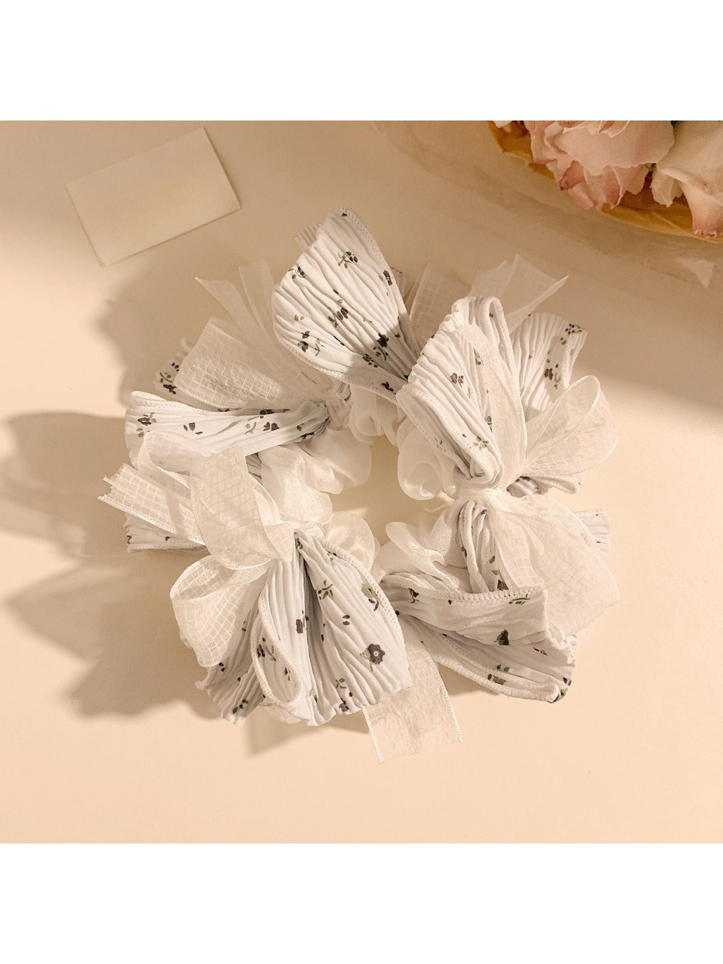 Gifty lace bow floral print scrunchie displayed on white background