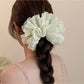 Side view of Gifty sweet printed scrunchie highlighting gathered fabric design
