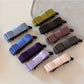 Side view of Beau vintage bow hair clip highlighting bow shape and fabric folds