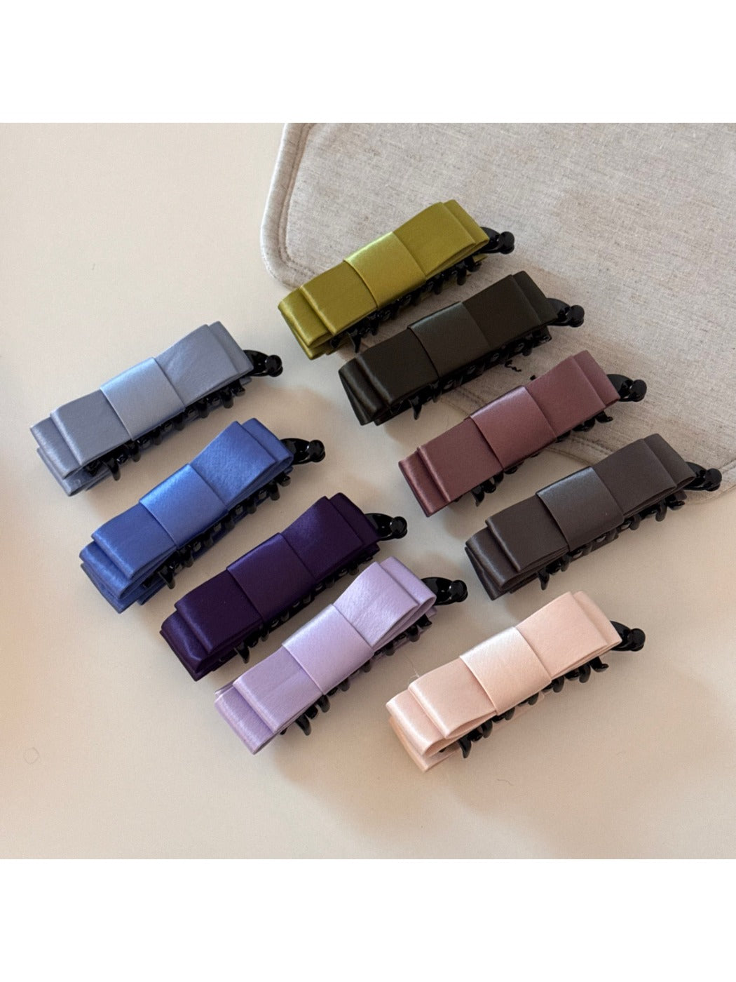 Side view of Beau vintage bow hair clip highlighting bow shape and fabric folds