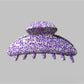 Beau Irregular Polka Dot Claw Clip resting on a white surface