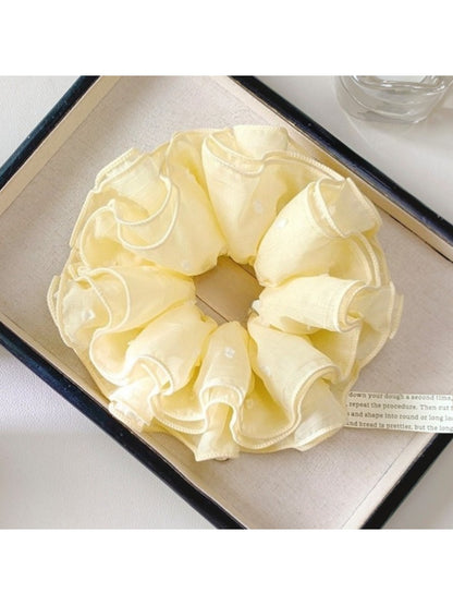 Gifty four layer scrunchie in pastel pink displayed flat to show full circular shape